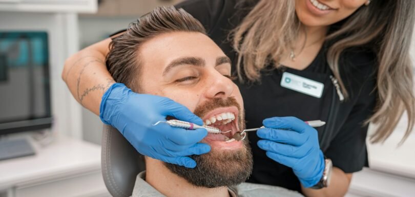 Dentist examining a patient's teeth